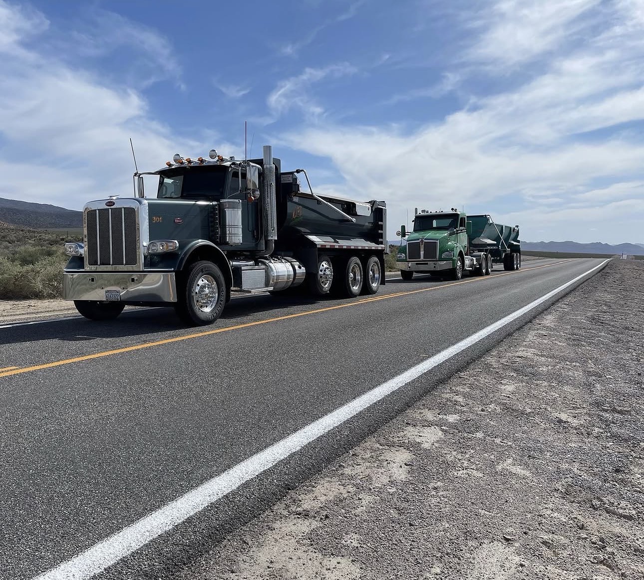D3 dump trucks on the highway